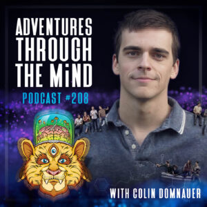Adventures Through The Mind podcast episode 208 cover art featuring guest Colin Domnauer, a PhD candidate in mycology at the University of Utah's Dentinger Lab. The graphic includes the ATTMind logo — a three-eyed feline with a glass dome of psilocybin mushrooms growing from a brain — alongside Domnauer's headshot, overlaid chemical structures referencing psychoactive compounds, and small groups of miniature people scattered across the image as a visual nod to the Lilliputian hallucinations produced by Lanmaoa asiatica, the hallucinogenic bolete mushroom at the center of this episode on psychedelic mushroom research.